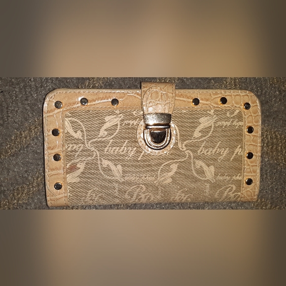 Gently used BabyPhat 6.5x3.5 thin fold studded wallet has slight discoloration - Picture 2 of 4